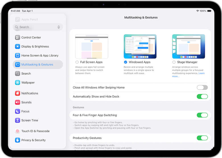 iPad running iPadOS 26 with multiple windows open